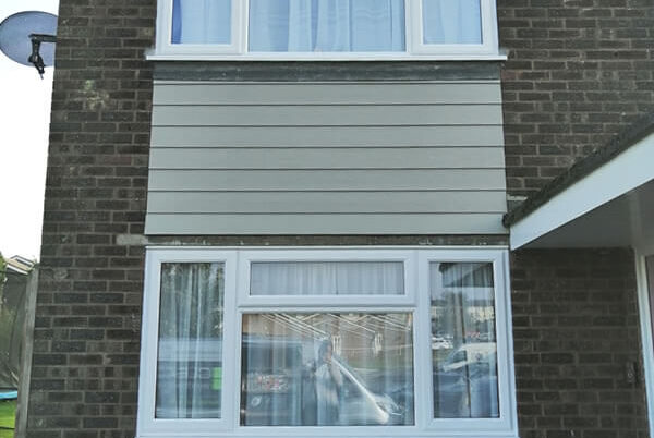 12 windows, 3 doors, new fascia, soffit boards and guttering. and Hardie plank cladding