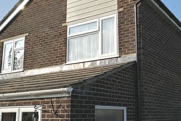 12 windows, 3 doors, new fascia, soffit boards and guttering. and Hardie plank cladding