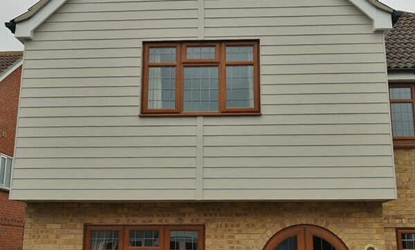 12 windows, 4 doors, replacement UPVC fascia and soffit board and Hardie plank cladding