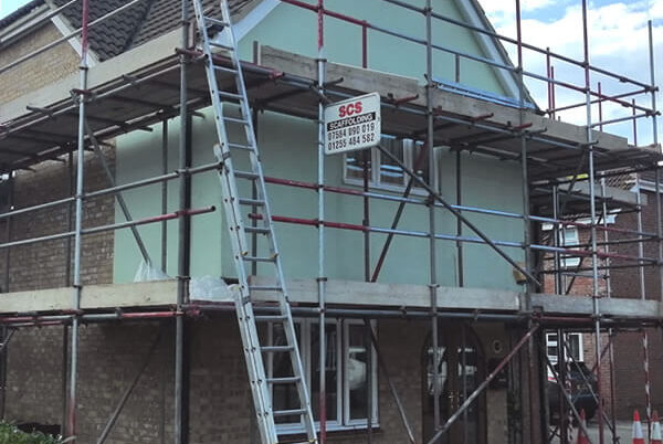 12 windows, 4 doors, replacement UPVC fascia and soffit board and Hardie plank cladding