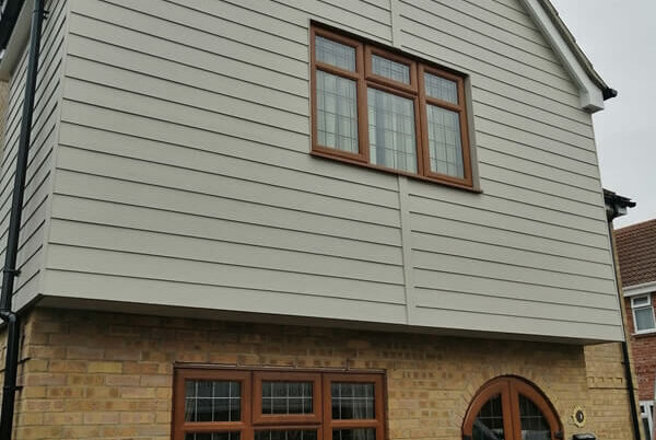 12 windows, 4 doors, replacement UPVC fascia and soffit board and Hardie plank cladding